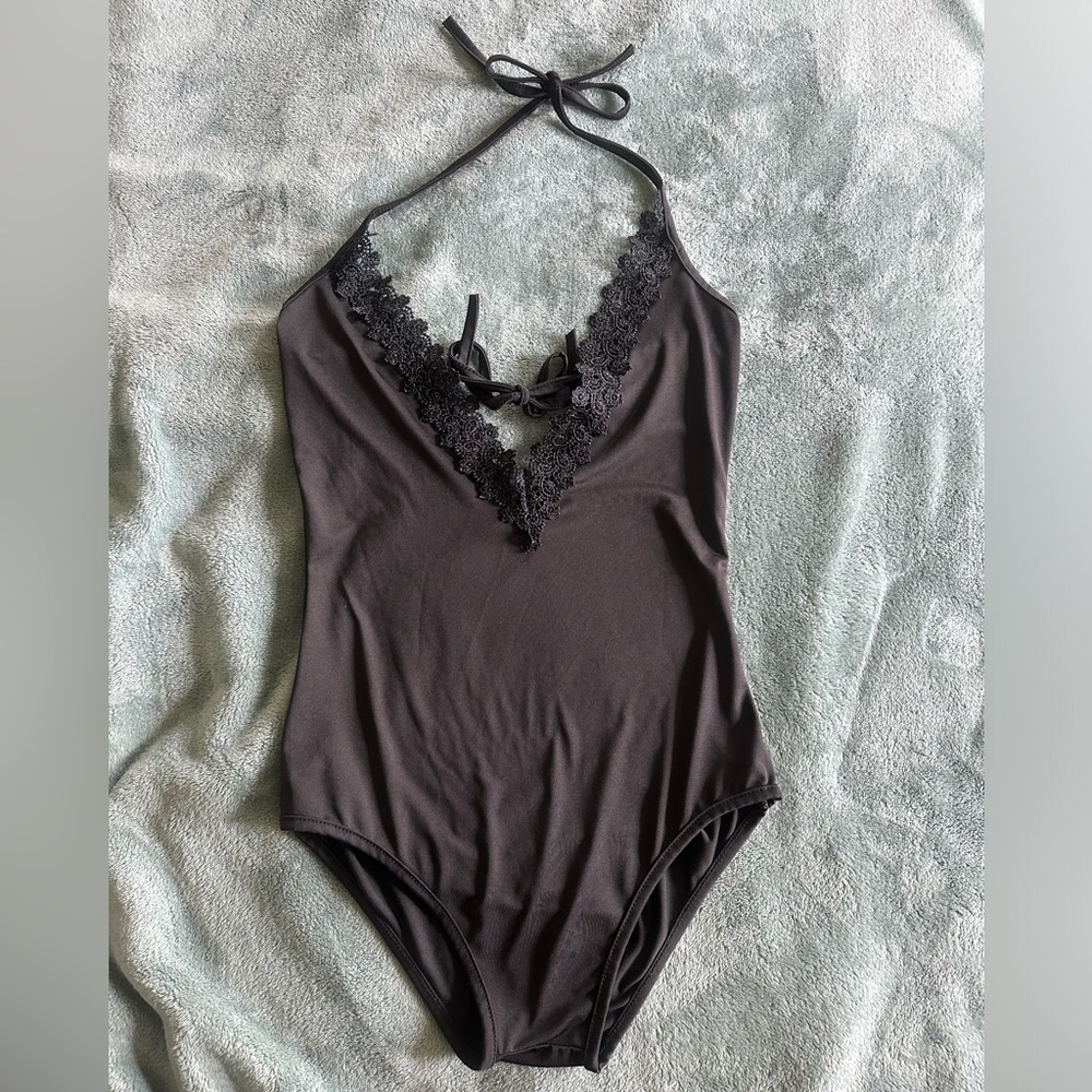 Black womens swimsuit, size medium, unlined (doubles as bodysuit).